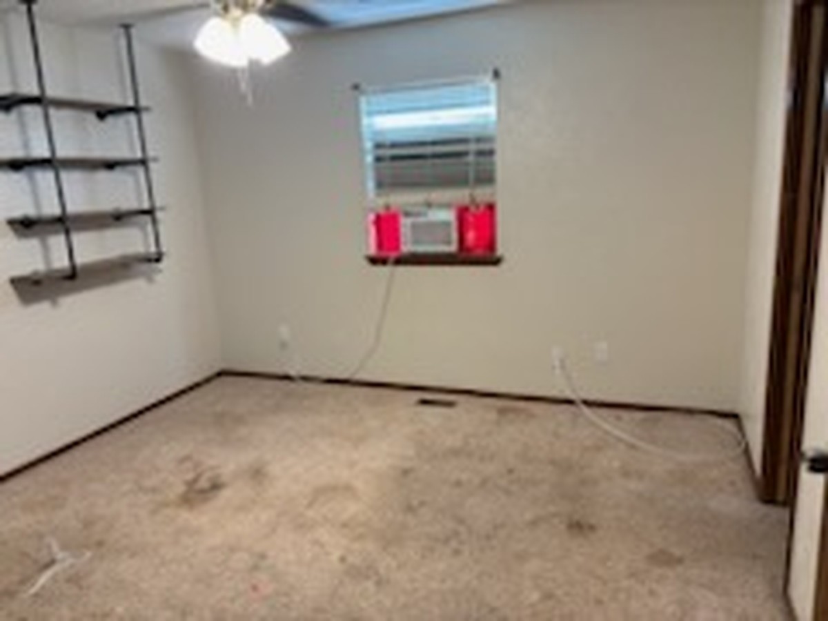 Bedroom cleared for the next tenant in Oklahoma City