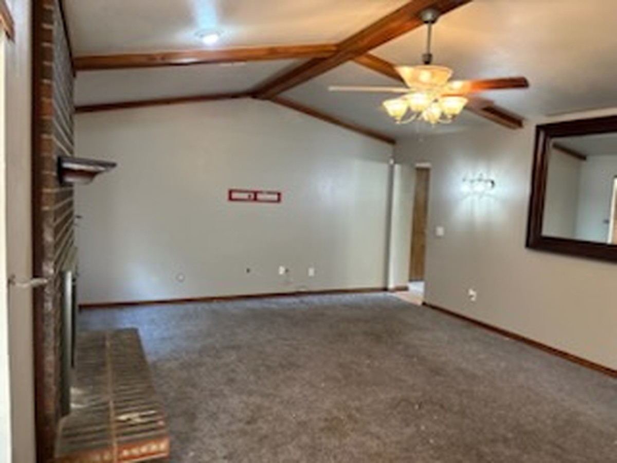 Empty living room after a move-out cleanout in Oklahoma City