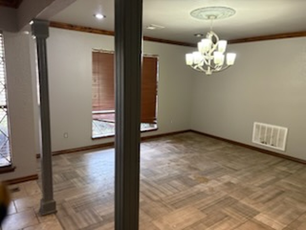 Empty dining room after a move-out cleanout in Oklahoma City