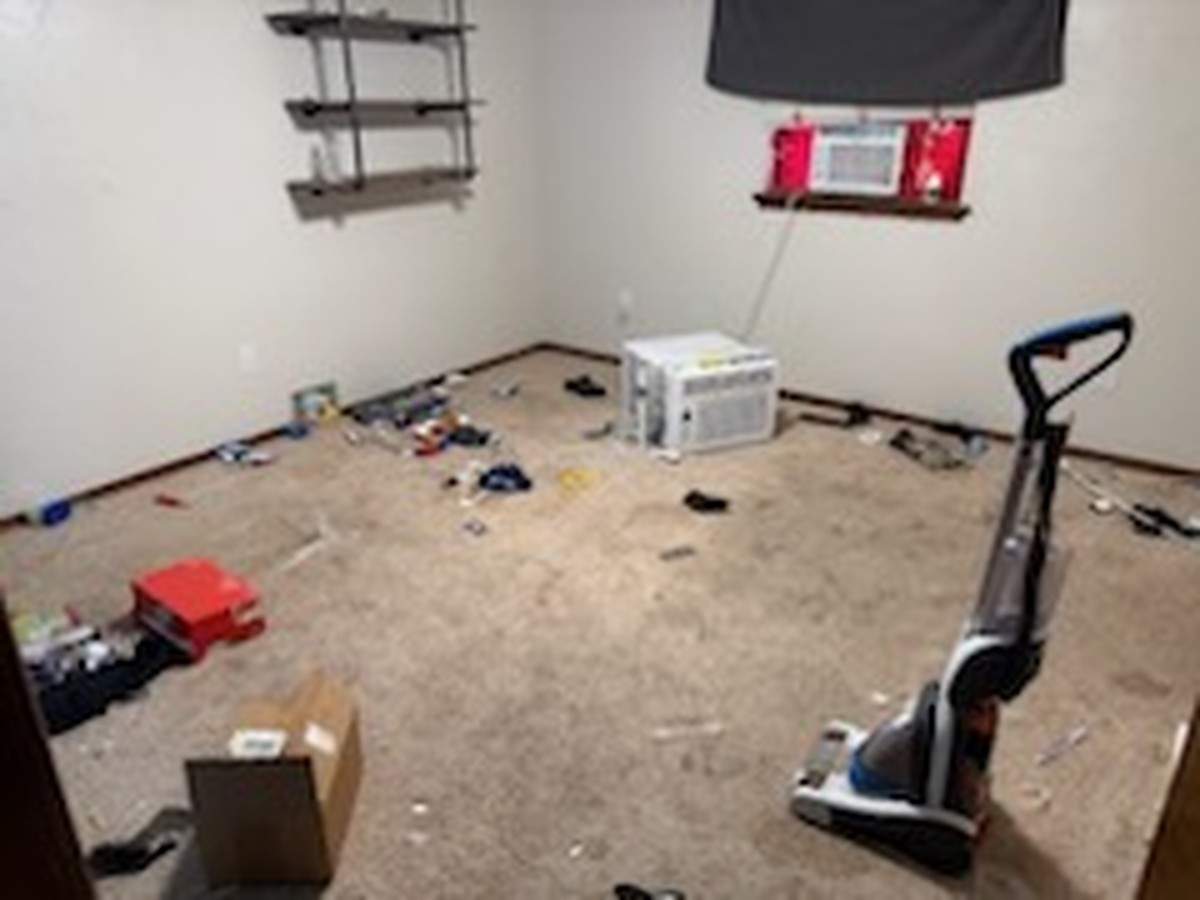 Bedroom with leftover items before junk removal in Oklahoma City